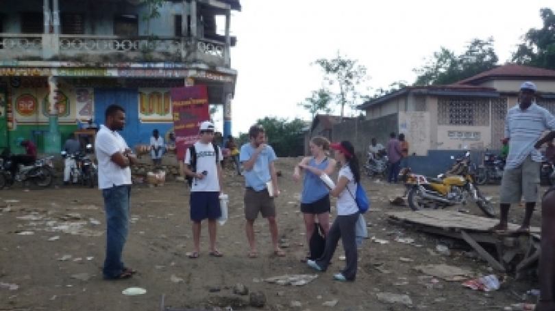 The students walk through the market place center in Fond des Blancs during their site assessment. (Photo courtesy of Jack Wilson) The students walk through the market place center in Fond des Blancs during their site assessment. (Photo courtesy of Jack Wilson)
