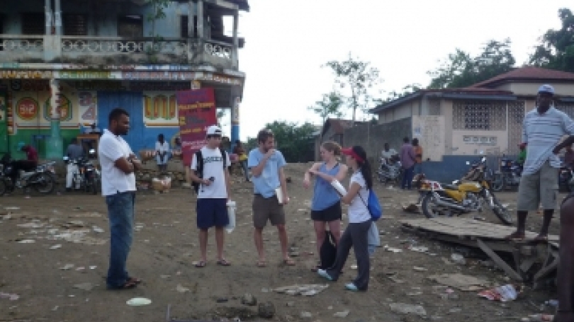 The students walk through the market place center in Fond des Blancs during their site assessment. (Photo courtesy of Jack Wilson)